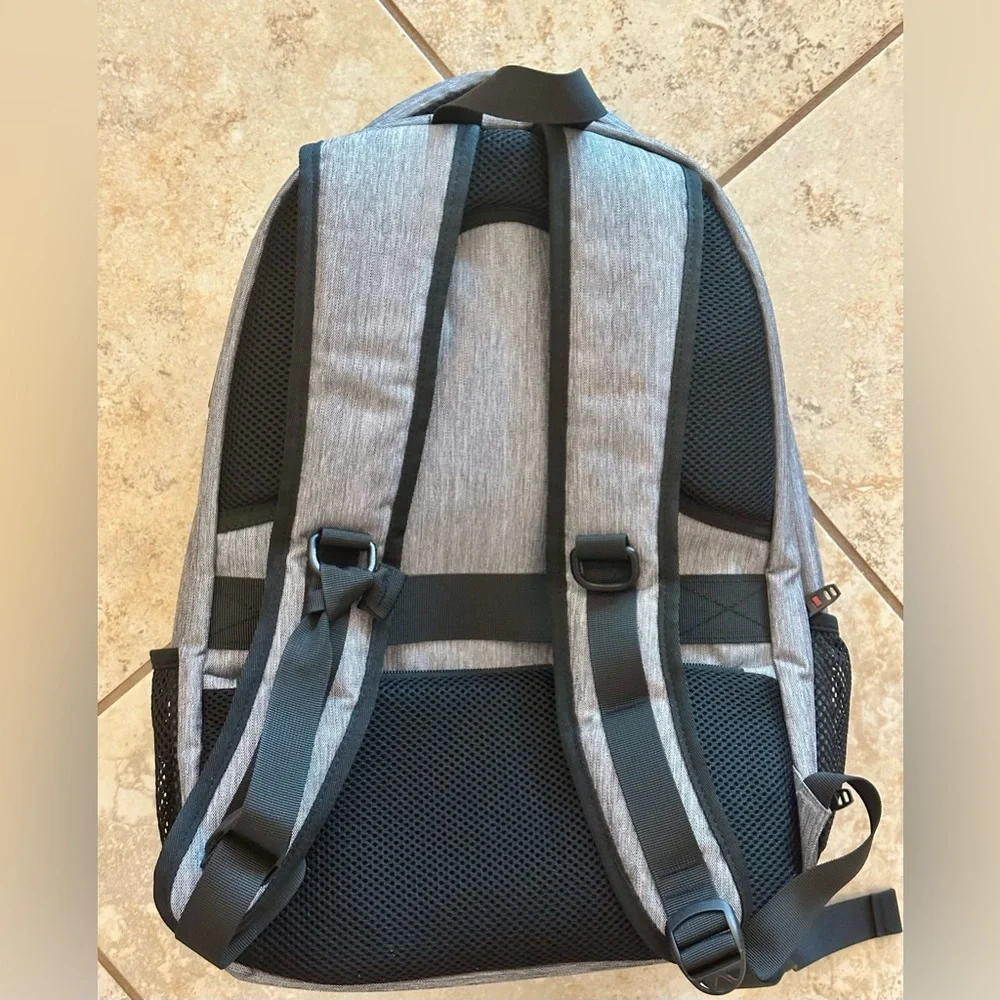 Backpack Excellent condition! Lots of zip compartments. Grey black. Clean!